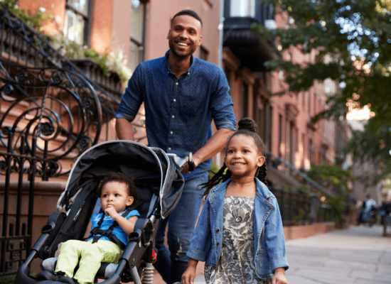 Photo of father with children in NYC